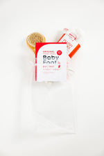 Baby Foot exfoliating foot peel from the Foot Care Essentials Bundle, showing the product bottle and packaging.