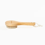 Baby Foot foot brush with ergonomic handle, designed for gentle foot cleaning and exfoliation in a compact, durable design.
