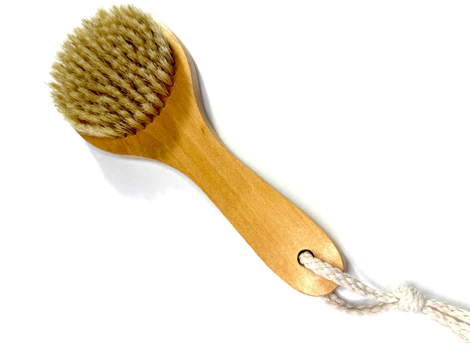 Baby Foot foot brush with soft bristles for exfoliating and cleaning feet, ideal for smooth, healthy skin.